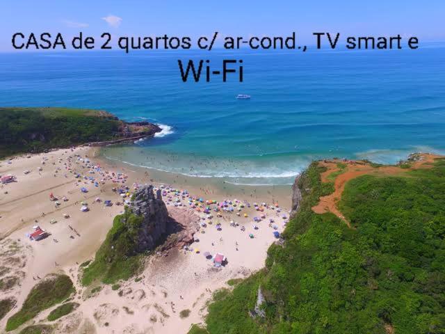 Casa De 2 Quartos Com 2 Ares-Condicionados Em Torres-Rs - Na Mais Bela Praia Gaucha - Cozinha - Banheiro - Tv Smart 32 E Wi-Fi - Estacionamento - Anfitria Superhost No Bnb Villa Eksteriør billede