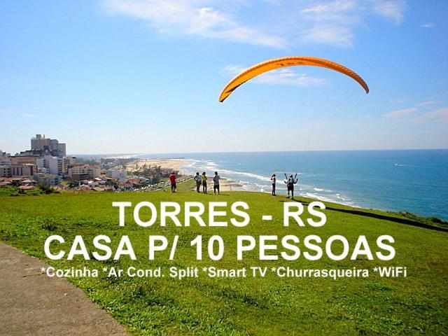 Casa De 2 Quartos Com 2 Ares-Condicionados Em Torres-Rs - Na Mais Bela Praia Gaucha - Cozinha - Banheiro - Tv Smart 32 E Wi-Fi - Estacionamento - Anfitria Superhost No Bnb Villa Eksteriør billede